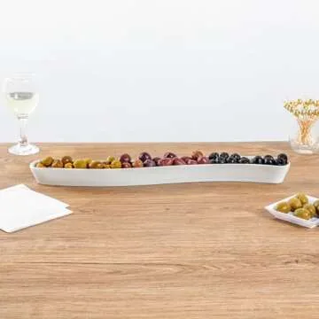 Restaurantware Swerve 14 Ounce Olive Plate 1 Curved Olive Tray - Small Chip Resistant White Porcelain Olive Canoe Dishwasher Safe For Snacks Condiments Or Appetizers