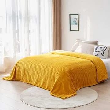 DISSA Fleece Blanket Twin Size – 60x80, Yellow - Soft, Plush, Fluffy, Fuzzy, Warm, Cozy – Perfect Throw for Couch, Bed, Sofa - with Pompom Fringe - Flannel Blanket