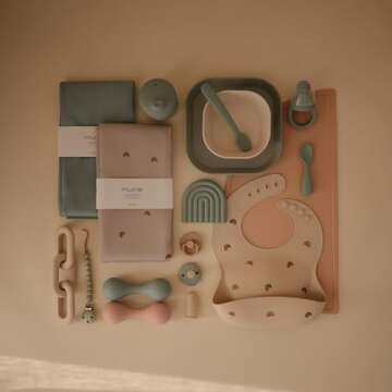 mushie Silicone Baby Bib | Adjustable Fit Waterproof Bibs (Rainbows)