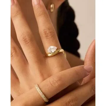 PAVOI 14K Yellow Gold Plated Pear Solitaire Premium Cubic Zirconia Engagement Ring for Women - Trend...