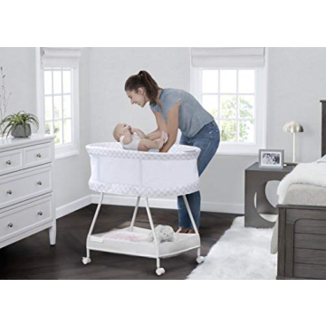 Delta Children Sweet Dreams Bassinet with Vibration and Music