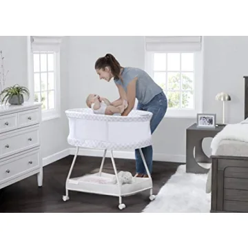 Delta Children Sweet Dreams Bassinet with Vibration and Music