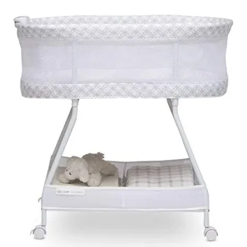 Delta Children Sweet Dreams Bassinet with Vibration and Music