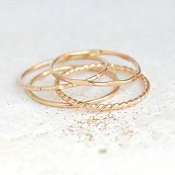 gold stacking rings. SET of FOUR. 14k gold filled metal stack rings. minimalist rings. stackable gold rings. twist, hammered, stardust, smooth.