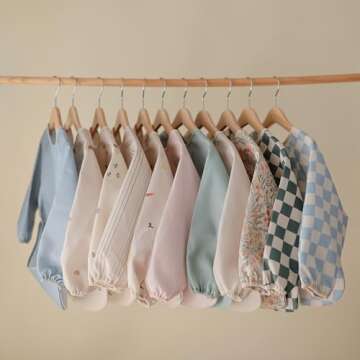 mushie Long Sleeve Baby Bib | Mess Free & Waterproof Fabric for Toddlers | Adjustable Fit for Ages 6-24 Months (Bees)