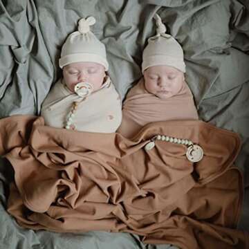 mushie Stretchy Baby Swaddle Blanket | Extra Soft & Snug Fit | 47"x47" (Blush)