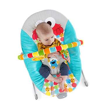 Bright Starts Sesame Street Baby Bouncer Soothing Vibrations Infant Seat - I Spot Elmo! with Cookie Monster and Big Bird - Removable-Toy Bar, 0-6 Months Up to 20 lbs