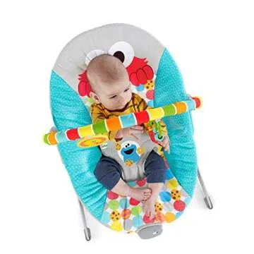 Bright Starts Sesame Street Baby Bouncer Soothing Vibrations Infant Seat - I Spot Elmo! with Cookie Monster and Big Bird - Removable-Toy Bar, 0-6 Months Up to 20 lbs