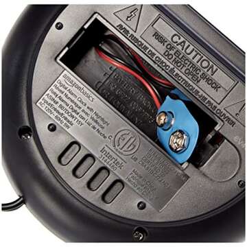 Amazon Basics Small Digital Oval Alarm Clock With LED Display, Nightlight & Battery Backup, Black, 4.5 x 3.5 x 2.4 Inches