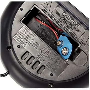 Amazon Basics Small Digital Oval Alarm Clock With LED Display, Nightlight & Battery Backup, Black, 4.5 x 3.5 x 2.4 Inches