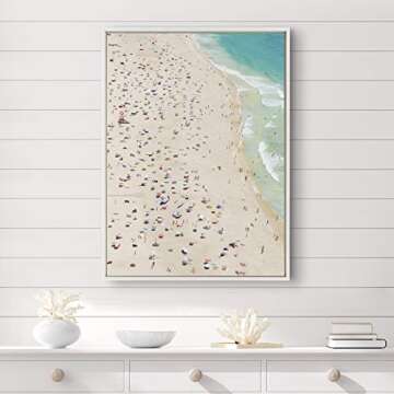 Kate and Laurel Sylvie Crowded Beach from Above Framed Canvas Wall Art by Amy Peterson, 28x38 White, Coastal Beach Art for Wall