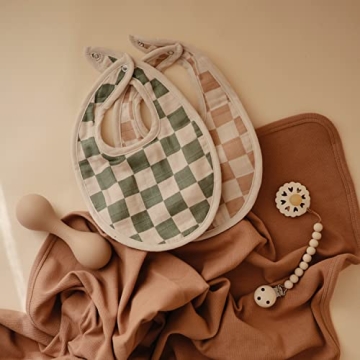 mushie Muslin Baby Bib | Soft Cotton for Infant Drips, Drools & Feedings | Adjustable Fit | 2 Pack (Olive Check/Natural Check)