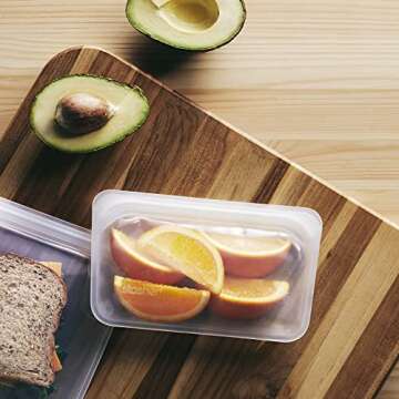 Stasher Silicone Reusable Storage Bag, Bundle 4-Pack Large (Clear+Aqua+Blueberry) | Food Meal Prep Storage Container | Lunch, Travel, Makeup, Gym | Freezer, Oven, Microwave, Dishwasher Safe, Leakproof