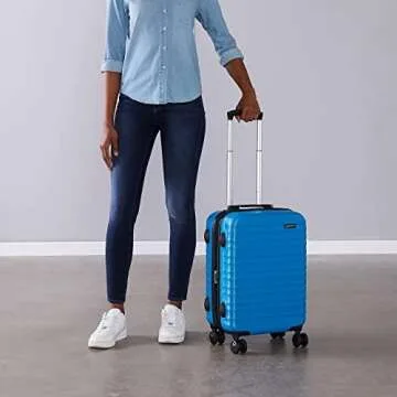Amazon Basics 21-Inch Hardside Carry-On Luggage, Hardshell Suitcase With Wheels, Expandable For Up to 25% More Space, With Scratch-Resistant Surface, Four Multi-directional Wheels, Light Blue