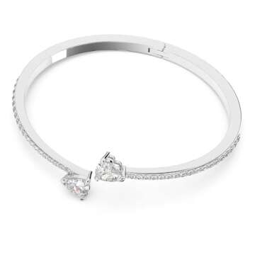 Swarovski Mesmera Bangle Bracelet, Heart-Shaped Clear Crystals on a Rhodium Finish Cuff, Size M, fro...