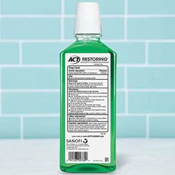 ACT Restoring Zero Alcohol Fluoride Mouthwash 18 fl. oz. for Strong Enamel, Mint Flavor