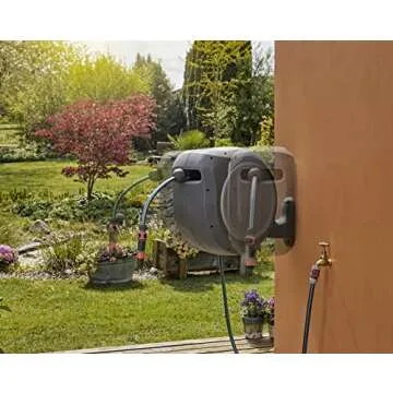 GARDENA (08055) Retractable Garden Hose Reel 100' ft, Wall Mounted, Automatic Retraction & Length Lock for Easy Watering. Heavy Duty Swivel Bracket 180°, Includes Nozzle.