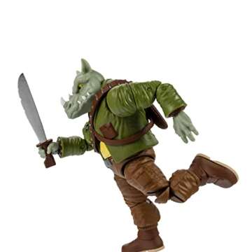 The Loyal Subjects BST AXN Teenage Mutant Ninja Turtles Rocksteady 5" Action Figure with Accessories...