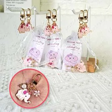 BUYWUMORE 12 Sets Baby Shower Pink Elephant Keychains It's a Girl Return Favor for Guests with Flower Sweets White Organza Bags and Thank You Tags Elephant Theme Party for Kids Party Supplies (Girl)