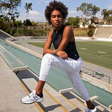 New Balance Women's Fresh Foam Roav V1 Sneaker, White/Black/Guava, 8