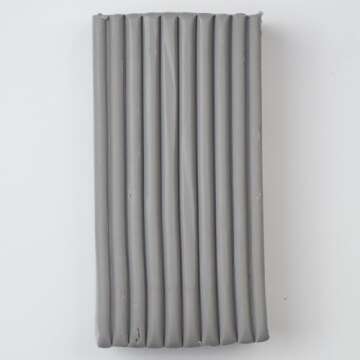 Super Sculpey Medium Gray, Premium, Non Toxic, Medium firmness, Sculpting Modeling Polymer clay, Oven Bake Clay, 1 pound bar. Great for all advanced sculptors, model makers and movie studios