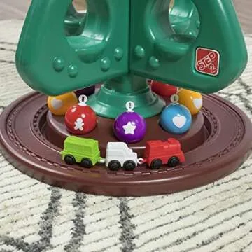 Step2 My First Christmas Tree, Kids Interactive Christmas Toy, 12 Colorful Plastic Ornaments to Decorate, Mini Train Set Circles The Skirt, for Toddles 1+ Years Old