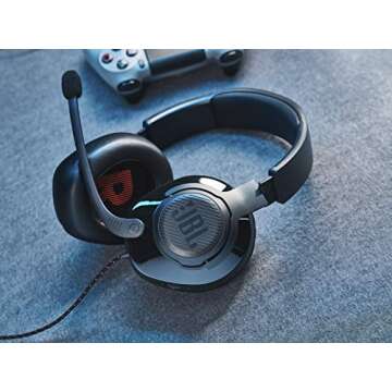 JBL Quantum 200 - Wired over-ear gaming headset with Voice focus directional flip-up mic and memory foam ear cushions (Black)