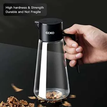 CCKO Glass Olive Oil Dispenser Bottle with Auto Flip Spout 19oz Olive Oil Bottle for Kitchen, No Drip Cooking Oil Dispenser for Soy Sauce, Syrup, Vinegar, Salad Dressing Container (Black)