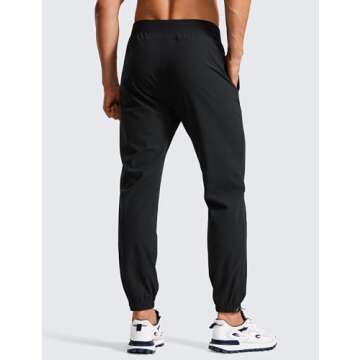 CRZ YOGA Athletic Joggers for Men - 29" Lightweight Running Training Pants with Zip Pockets and Ankl...