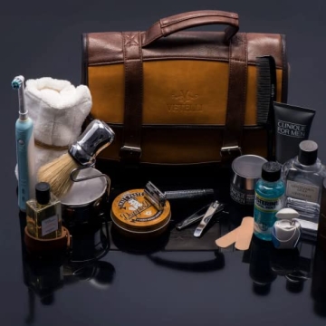Vetelli Leather Toiletry Bag for Men - Water Resistant, 2 Zippered Internal Pockets, 2 Snap-Fastened Internal Pockets, and Hanging Hook.