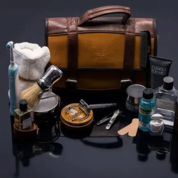 Vetelli Leather Toiletry Bag for Men - Water Resistant, 2 Zippered Internal Pockets, 2 Snap-Fastened Internal Pockets, and Hanging Hook.