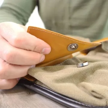 Vetelli Leather Toiletry Bag for Men - Water Resistant, 2 Zippered Internal Pockets, 2 Snap-Fastened Internal Pockets, and Hanging Hook.