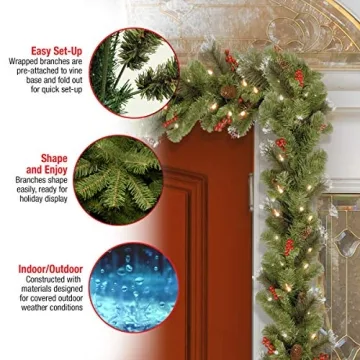 National Tree Company Pre-Lit Artificial Christmas Garland, Green, Crestwood Spruce, White Lights, Decorated with Pine Cones, Berry Clusters, Plug In, Christmas Collection, 9 Feet