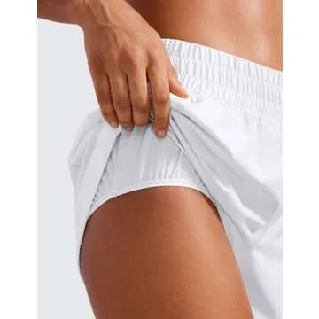 CRZ YOGA Womens High Waisted Running Shorts Mesh Liner 3'' Dolphin Quick Dry for Athletic Gym Track Workout with Zip Pocket White Medium
