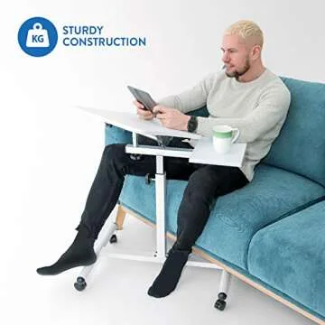 Tatkraft Bianca Ergonomic Sit-Stand Laptop Desk with Mouse Board on Wheels, Adjustable Height 72 – 110 cm, Tabletop 360° Swivel and 160° Tilt, Suitable for 7-17’’ laptops, Sturdy Elegant Design, White