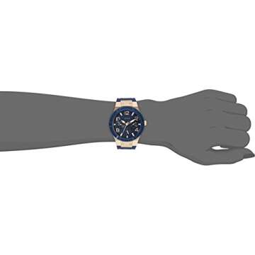 GUESS Women's Rose Gold-Tone Dial with Iconic Blue Stain Resistant Silicone Strap (Model: U0571L1)
