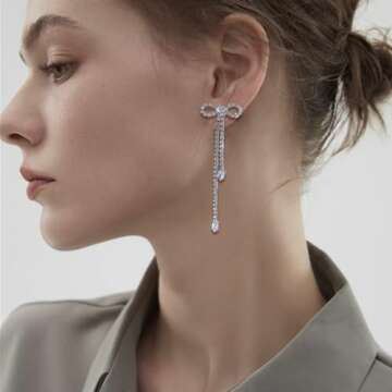 Luxval Silver Bow Earrings for Women Sparkle Earrings Rhinestone Drop Earrings Long Silver Earrings Dangle Bling Bowknot Earrings Fashion Jewelry Gift