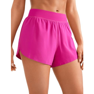 CRZ YOGA Mid Waisted Dolphin Athletic Shorts - 4" Lightweight High Split Gym Workout Shorts with Lin...