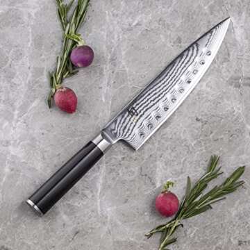 Shun Classic 8" Hollow Ground Chef's Knife, Handcrafted Japanese Knife for Professional and Home Chefs, VG-MAX Core with Damascus Stainless Steel Cladding, Pakkawood Handle