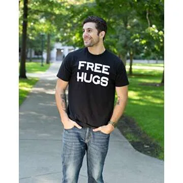 Ann Arbor T-shirt Co. Free HUGS | Cute, Funny Optimist Humanist Silly Hugging Men Women T-Shirt-(Adult, M) Black