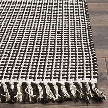 SAFAVIEH Montauk Collection Area Rug - 9' x 12', Ivory & Black, Handmade Flat Weave Boho Farmhouse Cotton Tassel Fringe, Ideal for High Traffic Areas in Living Room, Bedroom (MTK340D)