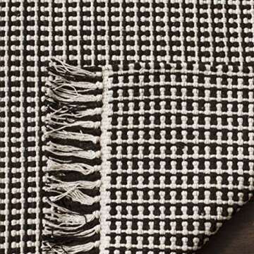 SAFAVIEH Montauk Collection Area Rug - 9' x 12', Ivory & Black, Handmade Flat Weave Boho Farmhouse Cotton Tassel Fringe, Ideal for High Traffic Areas in Living Room, Bedroom (MTK340D)