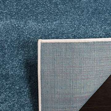 SAFAVIEH Hollywood Collection Accent Rug - 4' x 6', Peacock Blue & Fuchsia, Mid-Century Modern Design, Non-Shedding & Easy Care, Ideal for High Traffic Areas in Foyer, Living Room, Bedroom (HLW706C)