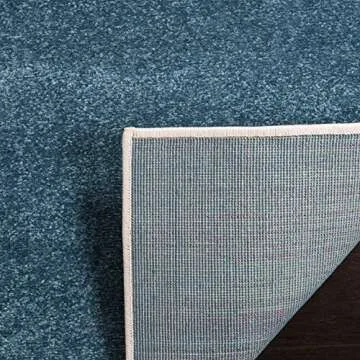 SAFAVIEH Hollywood Collection Accent Rug - 4' x 6', Peacock Blue & Fuchsia, Mid-Century Modern Design, Non-Shedding & Easy Care, Ideal for High Traffic Areas in Foyer, Living Room, Bedroom (HLW706C)