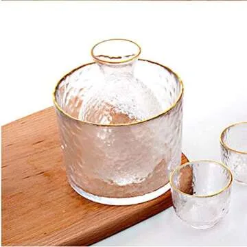 BOLLAER Sake Pot Set, Japanese Cold Sake Glasses, Clear Unique Trendy Floating Design, 1 Sake Carafe Bottle 1 Sake Tank and 4 Saki Cups for Cold/Warm/Hot Sake, Birthday Housewarming Gift Set