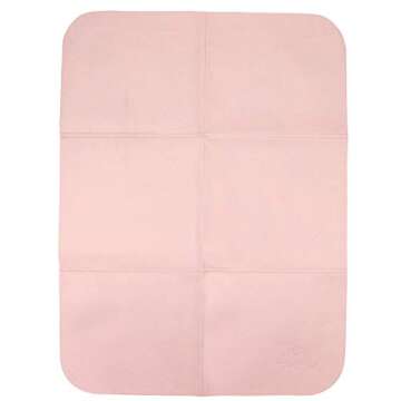 Itzy Ritzy Mini Diaper Bag Backpack – Chic Mini Diaper Bag with Changing Pad, 8 Total Pockets (4 Internal and 4 External), Grab-Top Handle and Rubber Feet (Blush)