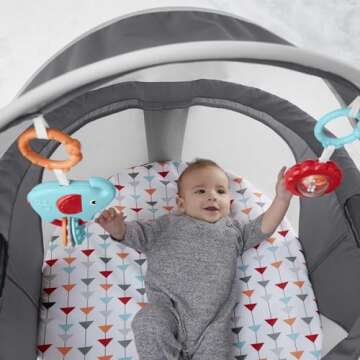 Fisher-Price Portable Bassinet On-The-Go Baby Dome, Travel Play Space with Developmental Newborn Toys & Canopy, Arrows Away