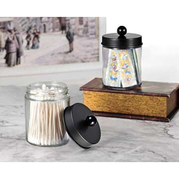 Amolliar Apothecary Jars Bathroom Storage Organizer - Cute Qtip Dispenser Holder Vanity Canister Jar Glass with Lid for Cotton Swabs,Rounds,Bath Salts,Makeup Sponges,Hair Accessories/Black（2 Pack）