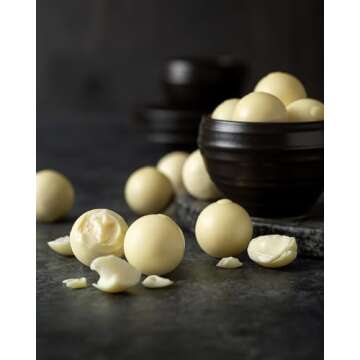 Encore Gourmet Gift Basket: Elevate the Moment with White Chocolate Lindor Truffles, Everything Bagel Cashews, Cranberry Crunch Mix, Bear Snack Mix, and Chocolate Drizzled Caramel Popcorn.