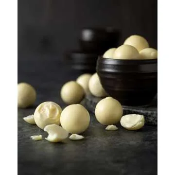 Encore Gourmet Gift Basket: Elevate the Moment with White Chocolate Lindor Truffles, Everything Bagel Cashews, Cranberry Crunch Mix, Bear Snack Mix, and Chocolate Drizzled Caramel Popcorn.